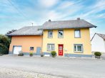 Energieeffizient & bezugsfertig: Großzügiges EFH mit Gartenparadies in Auderath - Vorderansicht