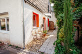 Zweifamilienhaus mit Garten und Moselblick in hochwasserfreier Lage von St. Aldegund, Nähe Zell - Eingangsbereich Wohnung 1