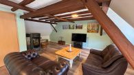 Schönes, gepflegtes Einfamilienhaus mit Terrasse und Garage in hochwassersicherer Lage in Zell-Kaimt - Wohnzimmer