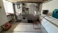 Schönes, gepflegtes Einfamilienhaus mit Terrasse und Garage in hochwassersicherer Lage in Zell-Kaimt - Waschküche