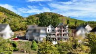 Zwei Häuser, 13 Ferienwohnungen, unverbaubarer Moselblick – etablierter Betrieb mit ca. 8 % Rendite - Moselansicht
