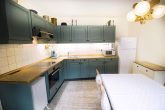 Gepflegtes Massivhaus mit Terrasse & Garage – Ideal als Ferienimmobilie - Küche
