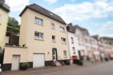 Gepflegtes Massivhaus mit Terrasse & Garage – Ideal als Ferienimmobilie - Forderansicht