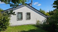 Ferienimmobilie mit großem Garten und Garage, auch als Festwohnsitz im Hunsrück - Haus Seitenansicht