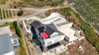 Vorbereitetes Bauprojekt: einzigartiger Panoramablick– Bauplatz mit Bodenplatten, Keller, Anschlüsse - Luftansicht