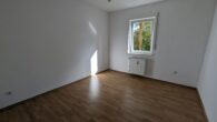 Voll vermietetes Mehrfamilienhaus mit guter Rendite in ruhiger Lage von Urschmitt, Nähe Cochem - Wohnung EG Schlafzimmer 1