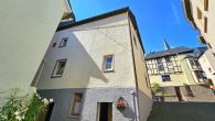 Gepflegtes Einfamilienhaus mit großem Nebengebäude und Garage in hochwasserfreier Lage von Briedel - Rückseite