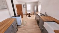 Gepflegtes Einfamilienhaus mit großem Nebengebäude und Garage in hochwasserfreier Lage von Briedel - Küche EG