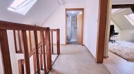 Gepflegtes Einfamilienhaus mit großem Nebengebäude und Garage in hochwasserfreier Lage von Briedel - Flur OG