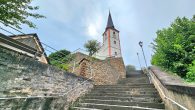 Gepflegtes Ein- bis Zweifamilienhaus mit Garten und Blick auf Weinberge und Mosel in Briedel - Briedeler Kirche