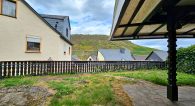 Gepflegtes Ein- bis Zweifamilienhaus mit Garten und Blick auf Weinberge und Mosel in Briedel - Garten