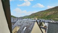 Gepflegtes Ein- bis Zweifamilienhaus mit Garten und Blick auf Weinberge und Mosel in Briedel - Blick über Briedel