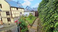 Gepflegtes Ein- bis Zweifamilienhaus mit Garten und Blick auf Weinberge und Mosel in Briedel - Garten