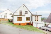 Renoviertes Einfamilienhaus mit großer Terrasse, Garten und Garage in beliebter Lage von Trier-Quint - Seitenansicht