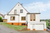 Renoviertes Einfamilienhaus mit großer Terrasse, Garten und Garage in beliebter Lage von Trier-Quint - Seitenansicht
