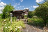 Wohnen auf einer Ebene mit Einliegerwohnung, Wellnessbereich und traumhaftem Garten in der Eifel - Garten