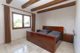 Wohnen auf einer Ebene mit Einliegerwohnung, Wellnessbereich und traumhaftem Garten in der Eifel - Schlafzimmer