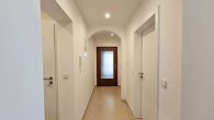 Attraktives Mehrfamilienhaus mit ca. 7 % Rendite in Pünderich - Flur Wohnung 1