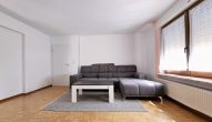 Attraktives Mehrfamilienhaus mit ca. 7 % Rendite in Pünderich - Wohnzimmer W1