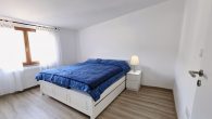 Attraktives Mehrfamilienhaus mit ca. 7 % Rendite in Pünderich - Schlafzimmer 1