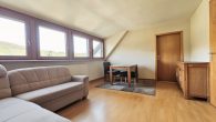 Attraktives Mehrfamilienhaus mit ca. 7 % Rendite in Pünderich - Wohnzimmer W3