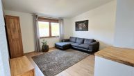 Attraktives Mehrfamilienhaus mit ca. 7 % Rendite in Pünderich - Wohnzimmer W4