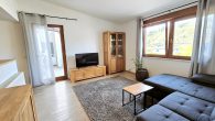 Attraktives Mehrfamilienhaus mit ca. 7 % Rendite in Pünderich - Wohnzimmer W4