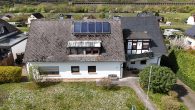 Attraktives Mehrfamilienhaus mit ca. 7 % Rendite in Pünderich - Vorderansicht