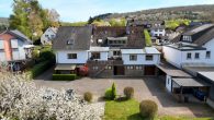 Attraktives Mehrfamilienhaus mit ca. 7 % Rendite in Pünderich - Hof und Rückansicht