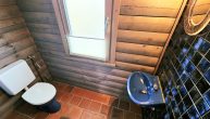 Schönes Blockhaus mit großem Garten, Garage und 2 Balkonen in ruhiger Hunsrücklage - Gäste WC OG