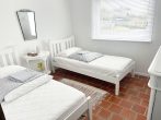 Schönes Blockhaus mit großem Garten, Garage und 2 Balkonen in ruhiger Hunsrücklage - Schlafzimmer EG