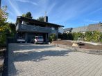 Schönes Blockhaus mit großem Garten, Garage und 2 Balkonen in ruhiger Hunsrücklage - Vorderansicht