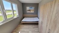 Wohnen und Arbeiten auf großem Grundstück in Beuren - Große Halle mit Wohnhaus, 3 Garagen und Garten - Schlafzimmer 2 Wohnhaus