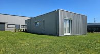 Wohnen und Arbeiten auf großem Grundstück in Beuren - Große Halle mit Wohnhaus, 3 Garagen und Garten - Rückansicht Wohnhaus