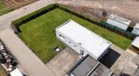 Wohnen und Arbeiten auf großem Grundstück in Beuren - Große Halle mit Wohnhaus, 3 Garagen und Garten - Luftansicht