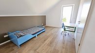 Modernes Einfamilienhaus im Hunsrück – Neubau mit großem Garten & KfW-40-Standard - Schlafzimmer OG