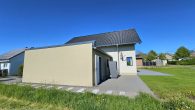 Modernes Einfamilienhaus im Hunsrück – Neubau mit großem Garten & KfW-40-Standard - Seitenansicht