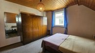 Gepflegtes Einfamilienhaus in Moselnähe, hochwassersicher Lage mit Garten in Bullay - Schlafzimmer OG
