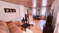 Einfamilienhaus in hochwassersicherer Lage plus Gebäude mit Garage und Terrasse in Ediger-Eller - Wohnzimmer