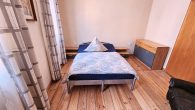 Einfamilienhaus in hochwassersicherer Lage plus Gebäude mit Garage und Terrasse in Ediger-Eller - Schlafzimmer