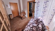 Einfamilienhaus in hochwassersicherer Lage plus Gebäude mit Garage und Terrasse in Ediger-Eller - Zimmer