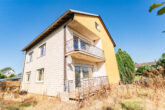 Einfamilienhaus, aufteilbar in zwei Wohneinheiten in ruhiger Lage in der Eifel - Rückansicht