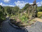 Modernisierte Doppelhaushälfte mit traumhafter Aussicht, liebevoll angelegtem Garten und Carport - Garten
