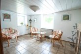 Wohnen in direkter Mosellage mit schönem Garten und Moselblick in Kröv/Kövenig - Wohnzimmer