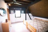 Wohnen in direkter Mosellage mit schönem Garten und Moselblick in Kröv/Kövenig - Zimmer DG