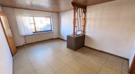 Freistehendes Einfamilienhaus mit großem Garten und Ausbaureserve in der Nähe von Rheinböllen - Wohnzimmer EG