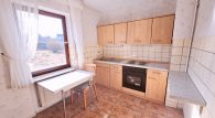 Freistehendes Einfamilienhaus mit großem Garten und Ausbaureserve in der Nähe von Rheinböllen - Küche EG