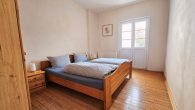 Modernisiertes Einfamilienhaus als Kapitalanlage oder zur Eigennutzung mit Calmontblick an der Mosel - Schlafzimmer EG