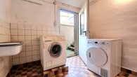 Sehr gepflegtes Einfamilienhaus mit Garage, Garten und Balkon in Bullay/Mosel - Waschküche