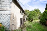 Perfektes Einfamilienhaus mit Garten und Garage - Garten